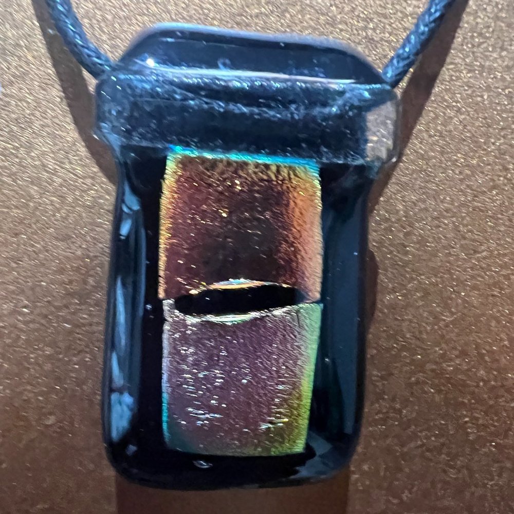 EUC Fused glass, black, bronze and silver fashion necklace on cord chain.